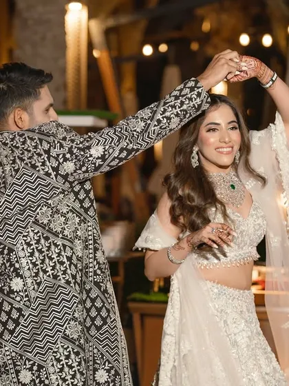 A candid shot of the bride and groom enjoying their dance. Our choreography is designed to feel natural, so you can relax and have fun.