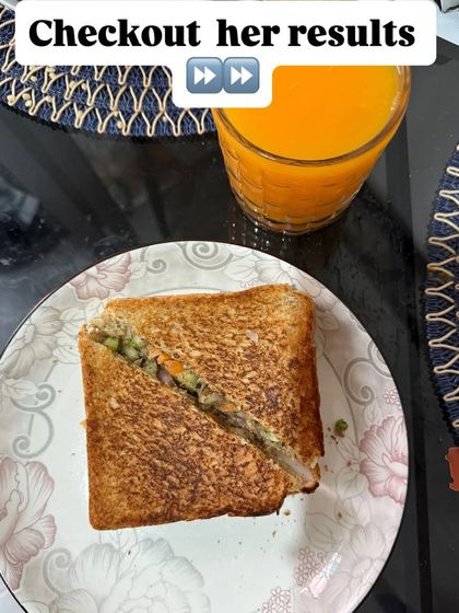 A toasted vegetable sandwich with a glass of fresh juice. A simple, quick, and healthy meal for a client on our ultimate gold plan.