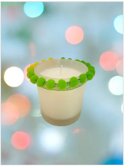 A scented candle in a frosted white glass jar, which I've decorated with a fun, green pom-pom lace. This shows how I can customize candles for a more festive or playful look.