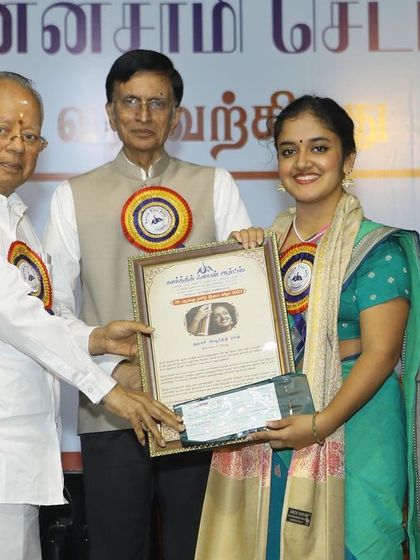 Receiving the 'ISAI CHUDAR' award certificate. Each award is a responsibility to uphold the traditions of our great art form.