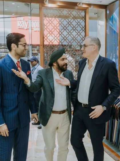 An engaging discussion with Mr. Gregor Thissen, Executive Chairman of Scabal, at our atelier. These interactions reinforce our commitment to sourcing only the finest materials for our discerning clientele.