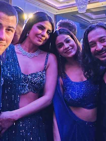 A happy group photo with Priyanka Chopra, Nick Jonas, and my collaborator Nidhi Prabhu.