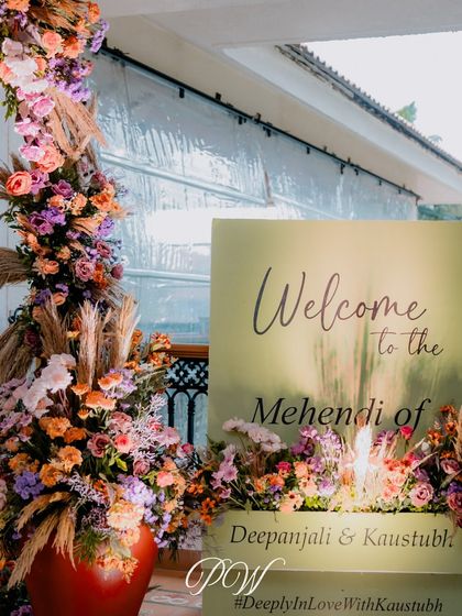 A beautiful welcome sign for a floral-themed Mehendi, setting a fresh and romantic tone for the celebration.