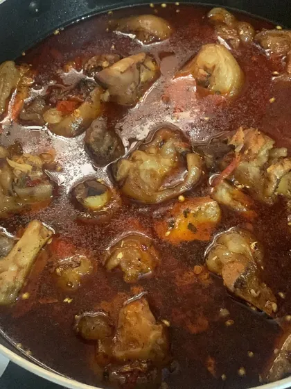 A pot full of my authentic pig trotter curry. The gravy is rich and spicy, perfect with a plate of steamed rice.