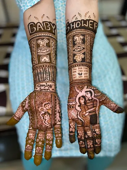 A variation of a popular baby shower design, this image shows the full artwork with a couple portrait, 'Coming Soon' text, and baby shirt motifs.