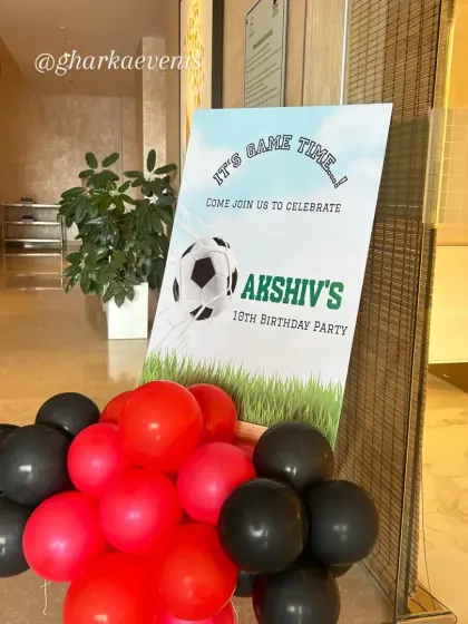 Welcoming guests to a football-themed birthday party. This custom sign with "It's Game Time!" sets the energetic tone for the celebration right from the entrance.