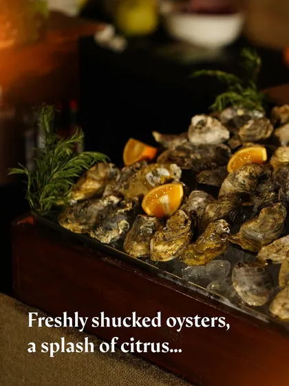 A close-up of our fresh oyster bar, a perfect pairing for celebratory events.