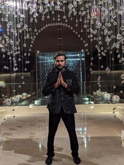 A moment of prayer and focus in a beautiful hotel lobby before my show for the Adani Group.