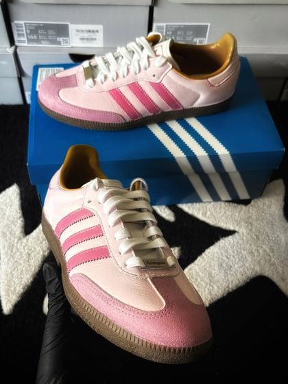 Another angle of the pink bubblegum custom sneakers.