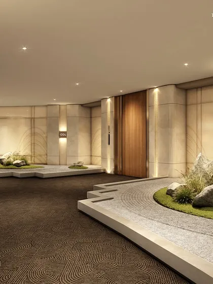 The corridors at Palais Royale are designed as moments of pause and tranquility. Here, a zen garden with carefully placed rocks and raked sand creates a serene focal point, reflecting our commitment to integrating wellness and mindful restoration into our designs.