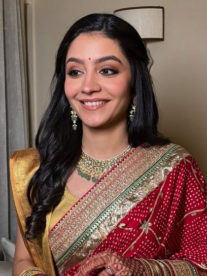 A closer look at this simple yet stunning reception makeup. The soft waves and radiant skin create a look that is both classic and modern.