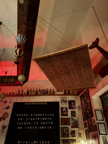 The decor at a bar in Milan. The flying carpet and travel-themed decorations felt very fitting for my journey.