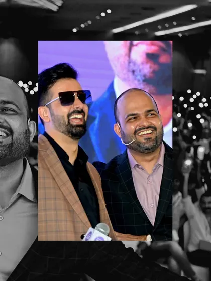 Sharing a laugh on stage with the main speaker, Harshubh Mahesh Shah, at the HMS India Tour.