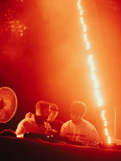 A dramatic, red-lit photo from the same B2B set with Kayvee. The lighting creates a powerful, intense mood that matches our techno selections.