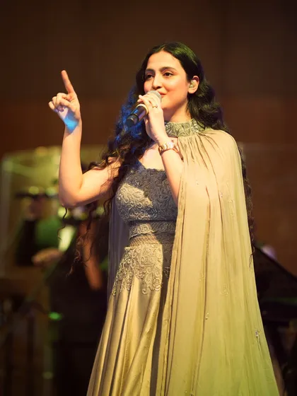 On stage is where I feel most at home. This shot captures a moment of pure connection with the music and the audience. Whether it's a grand concert or an elegant private event, I pour my heart into every note.