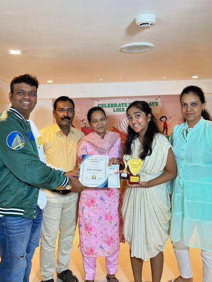 Presenting an award to Advika for completing the 3rd level in Abacus. Her dedication is a great example for other students at the academy.