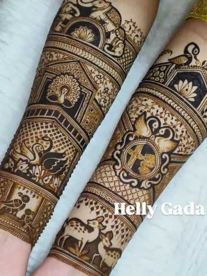 For the wild-hearted bride, I created this jungle-themed design. It features graceful deer, swans, parrots, and elephants, weaving a tale of nature and harmony from wrist to elbow.