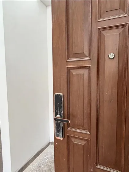 Even during construction, security is important. Here's the main entrance door with a modern digital lock, installed at our CR Park site.