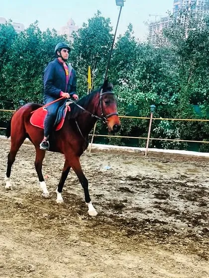 A rider practices his form during a training session. We offer lessons for all levels, helping riders progress at a comfortable pace.