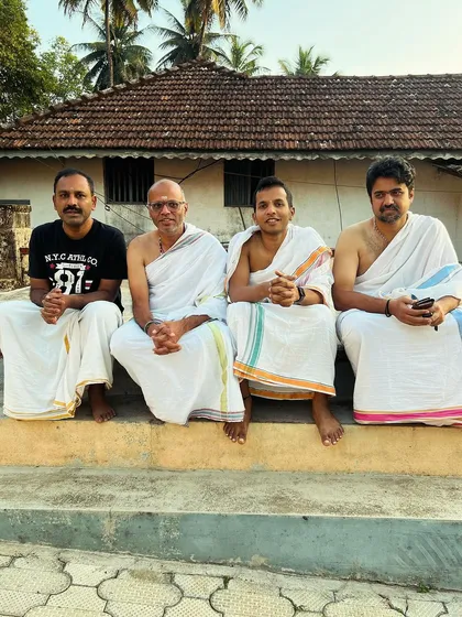 With my father and fellow seekers, dressed in traditional attire. Connecting with our roots and our elders is an important part of living a dharmic life.