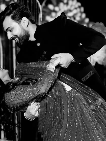 A beautiful black and white shot capturing a dip in a couple's dance. These are the moments that make for timeless photographs.