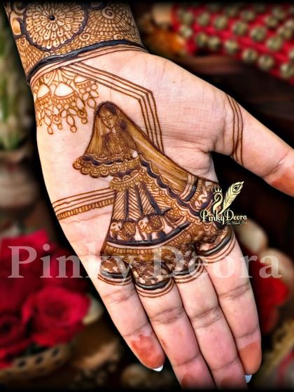 A delicate portrait of a bride in her veil, placed elegantly on the palm. This is a classic and timeless design element for any bride.