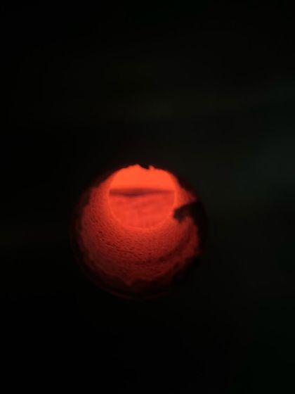 Looking through the peephole of a kiln as it glows hot inside. Whether it's a manual gas kiln or an automatic electric one, I still find myself sitting with it, feeling the heat rise. It’s a connection to the transformation happening within.