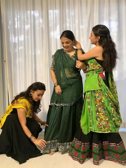 A behind the scenes photo from our Navratri Garba shoot. We love the entire process of creating a performance, from getting ready in traditional attire to the final take.