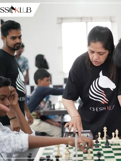 A coach offers guidance during a game at our Coimbatore opening. Our instructors are always present during tournaments to support students and help analyze their games afterward.