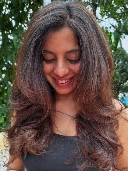 A fresh new look for this client. We did a full color transformation to this rich chocolate brown and finished with a healthy cut and bouncy blowout. The smile at the end says it all.