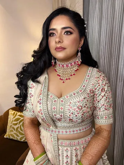 A beautiful soft glam look for an engagement ceremony. I focused on creating a flawless base, soft smokey eyes, and a neutral lip to let her natural beauty shine.