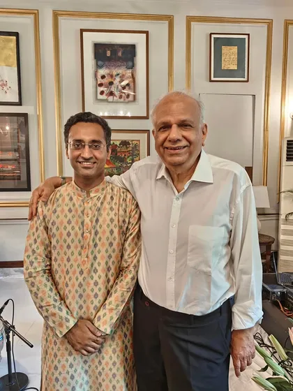 Sharing a moment with my host after an intimate 'Baithak' style house concert. These private performances are specially curated to create a personal and memorable musical evening for you and your guests.