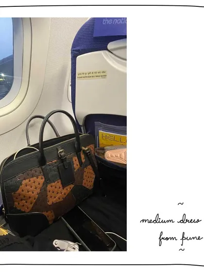 Our patron Adyasha traveling with her Medium Drew bag in our unique Kantha edit. This special edition features patchwork of different leathers, including an embossed ostrich-style hide, creating a one-of-a-kind texture and look.