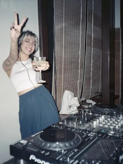Cheers to good times. A candid shot from a private party, raising a glass to a great night of music and celebration.