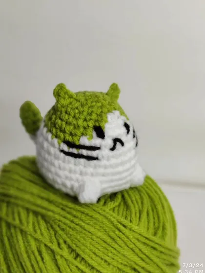 My collection of chubby cat keychains. These little guys come with different colored patches on their heads, including yellow, green, pink, blue, and grey.