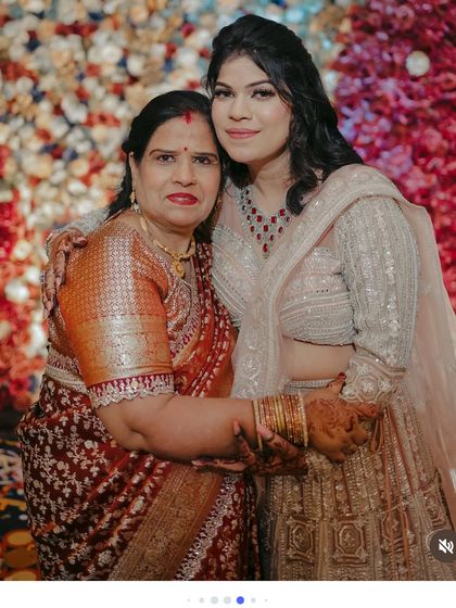 A close-up of the mother and daughter, showing the different makeup styles that suit their individual preferences and ages.