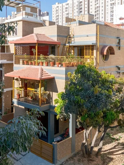 An elevated view showing the house in its urban context.