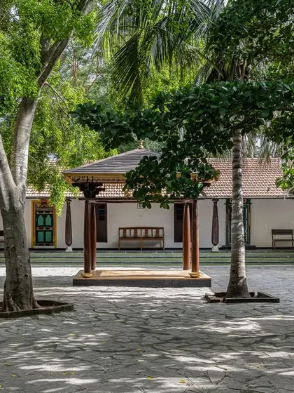 The Atithishala Mandap courtyard is a wide, open space perfect for hosting intimate ceremonies like a haldi or mehendi, surrounded by traditional architecture.