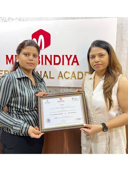 Handing over the certificate of completion is a special moment. Congratulations to our newest certified professional.