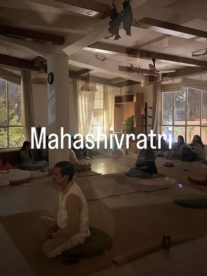The studio during our Mahashivratri event. The dim lighting and focused energy of the participants create an atmosphere of deep contemplation and spiritual connection.