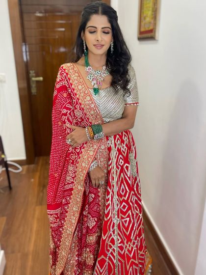 The full look is a perfect example of traditional elegance, ideal for any festive family function.