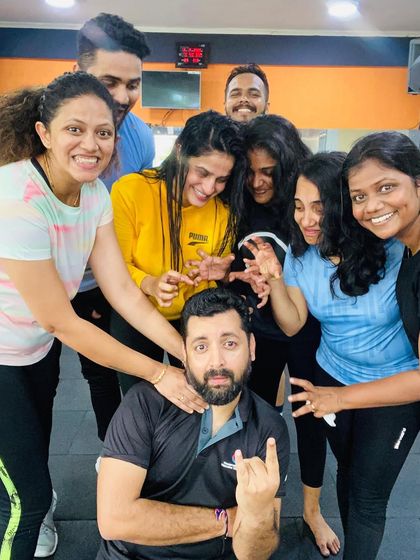 A playful moment with the group. We don't take ourselves too seriously.