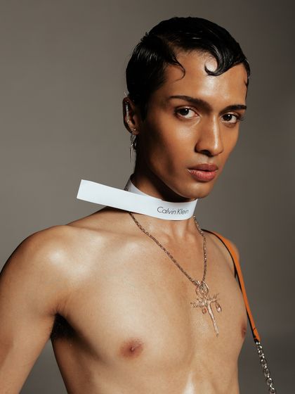 A close-up portrait showcasing the custom choker and a cross necklace. This highlights my attention to detail in accessory styling to build a specific character and mood.