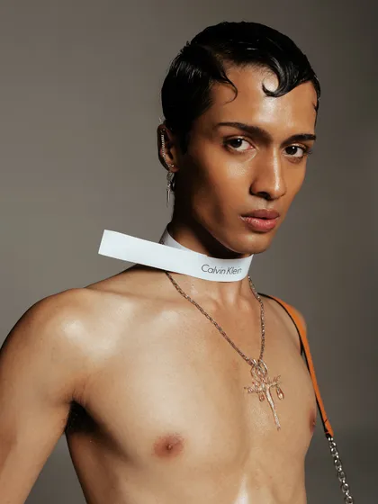 A close-up portrait showcasing the custom choker and a cross necklace. This highlights my attention to detail in accessory styling to build a specific character and mood.