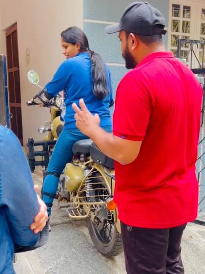 A student gets ready for her next practice run. The determination and focus in her expression show she's ready to conquer the challenge.