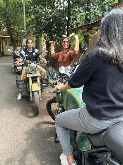 A graduate celebrates with her friends. Learning to ride together creates a special bond and shared memories.