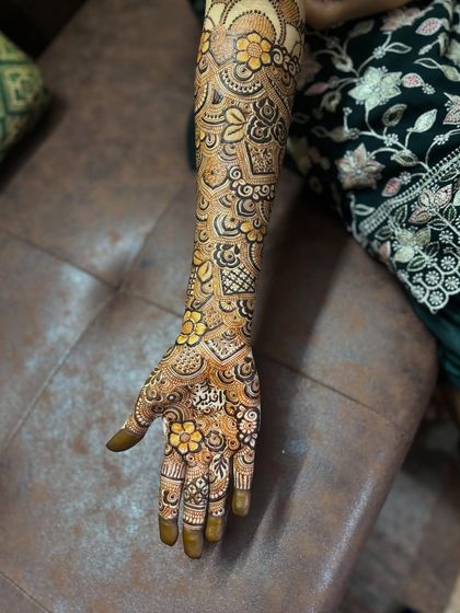 A close-up showing the intricate details within each floral element. I take my time to ensure every petal and leaf is perfectly executed.