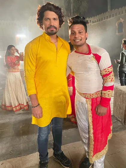 On set with Bhojpuri film actor Pravesh Lal Yadav during a song shoot. We are actively involved in the regional film industry, providing choreography and talent.
