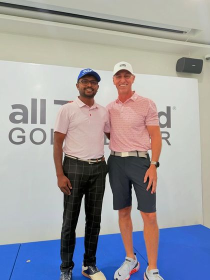 Continuous learning is a core value. Here, one of my coaches is pictured with an international expert at a short game seminar in Thailand.