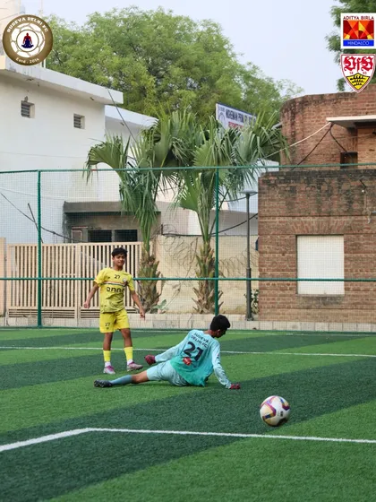 The moment after a shot. A player looks on as the goalkeeper is beaten. This is the result of countless hours of practice.